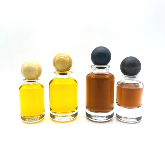 Venda imperdível Frasco de perfume de vidro cilíndrico de 50 ml 100 ml com tampa redonda de madeira